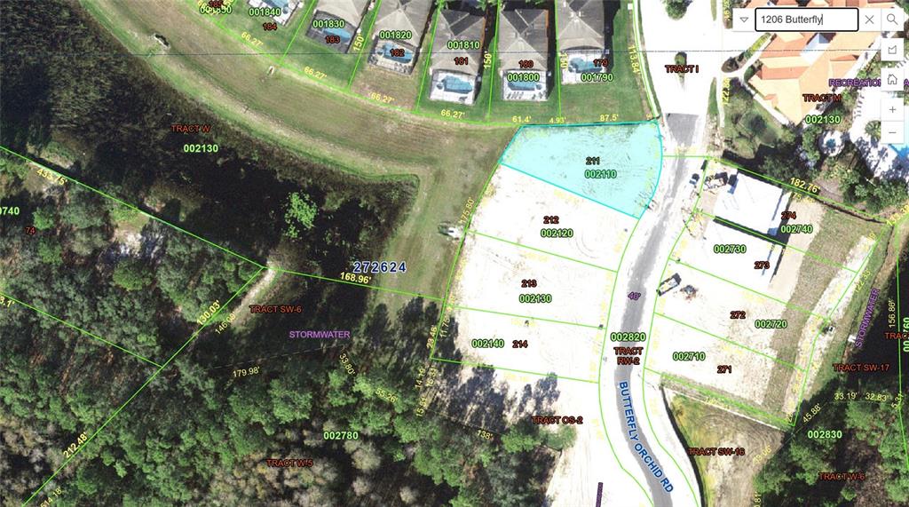 This is a satellite map showing residential property lots and surrounding land — 1206 BUTTERFLY ORCHID ROAD, DAVENPORT, FL