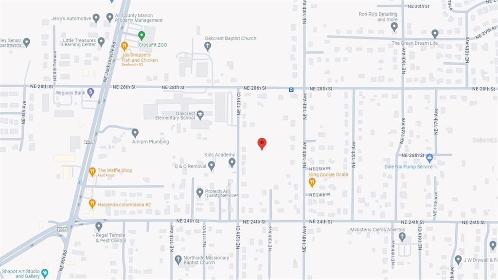 This is a map showing streets, landmarks, and businesses in a residential area — NE 13TH AVE, OCALA, FL