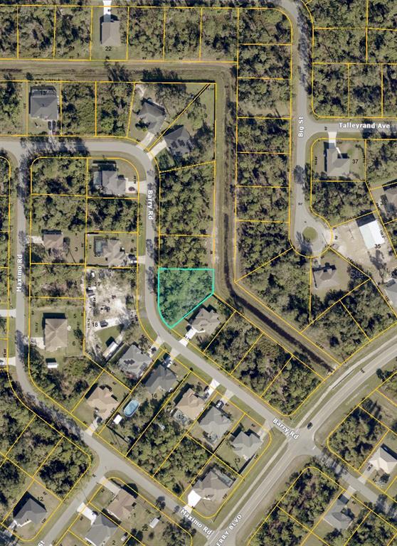 This is an aerial map showing a vacant lot highlighted in blue along a residential street — 000 BARRY ROAD, NORTH PORT, FL