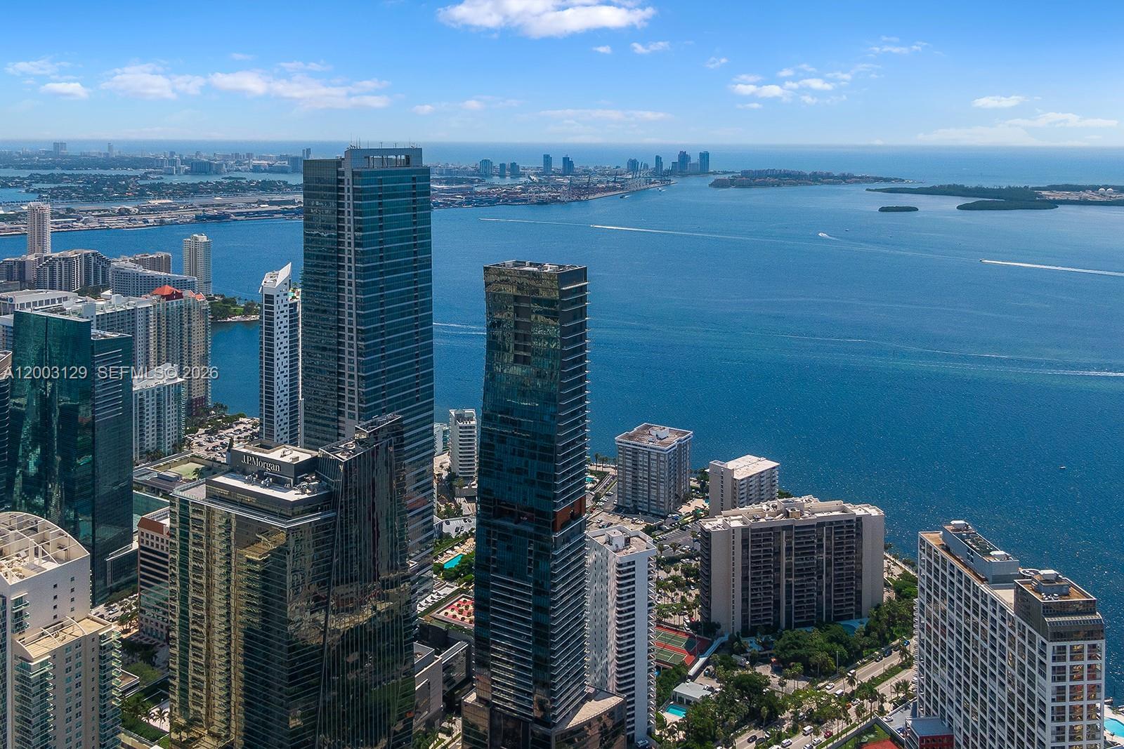 An aerial view of high-rise buildings and skyscrapers along the waterfront in Miami — 1451 Brickell Ave # 903, Miami FL 33131, MIAMI, FL