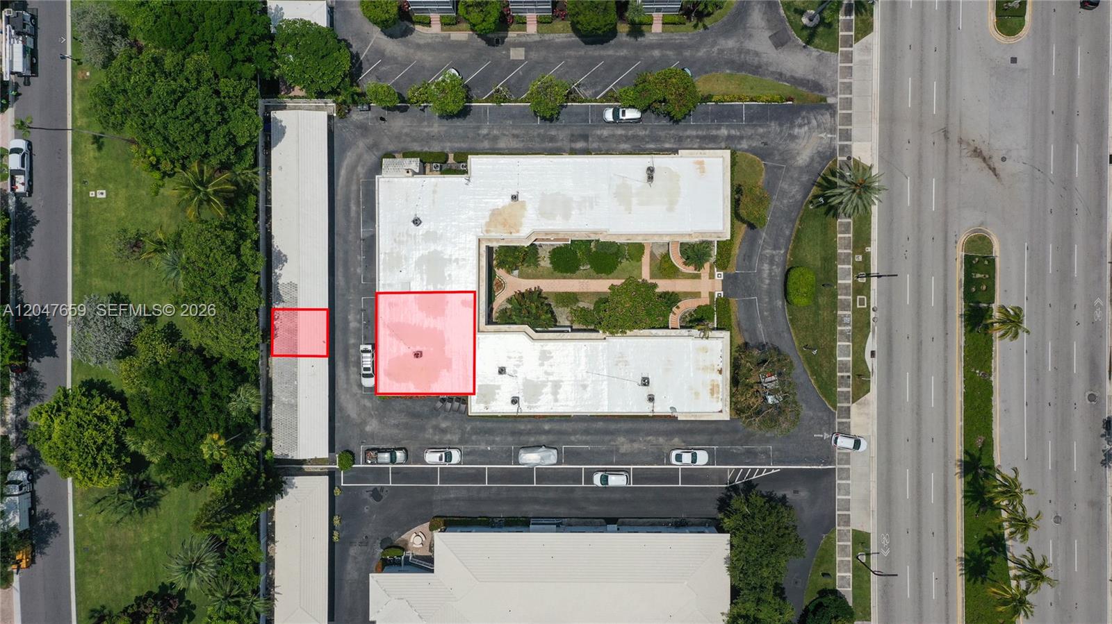 This aerial view shows a multi-unit residential complex with highlighted parking and building sections — 9940 Collins Ave # 10, Bal Harbour FL 33154, BAL HARBOUR, FL