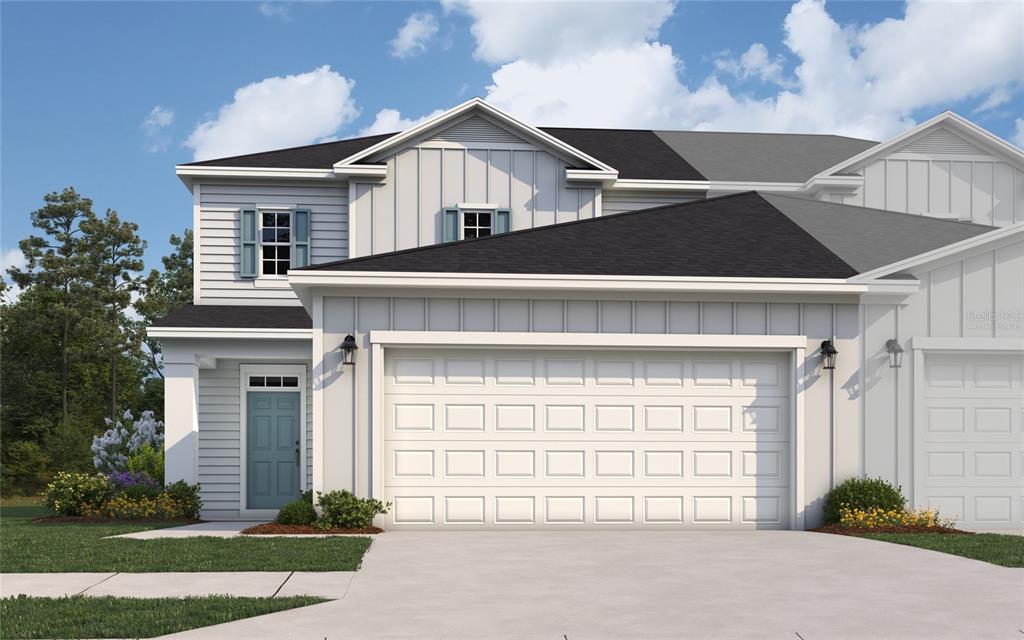 This is a rendering of a two-story suburban townhouse with a white garage and siding — 12 BIG PINE DRIVE, PALM COAST, FL
