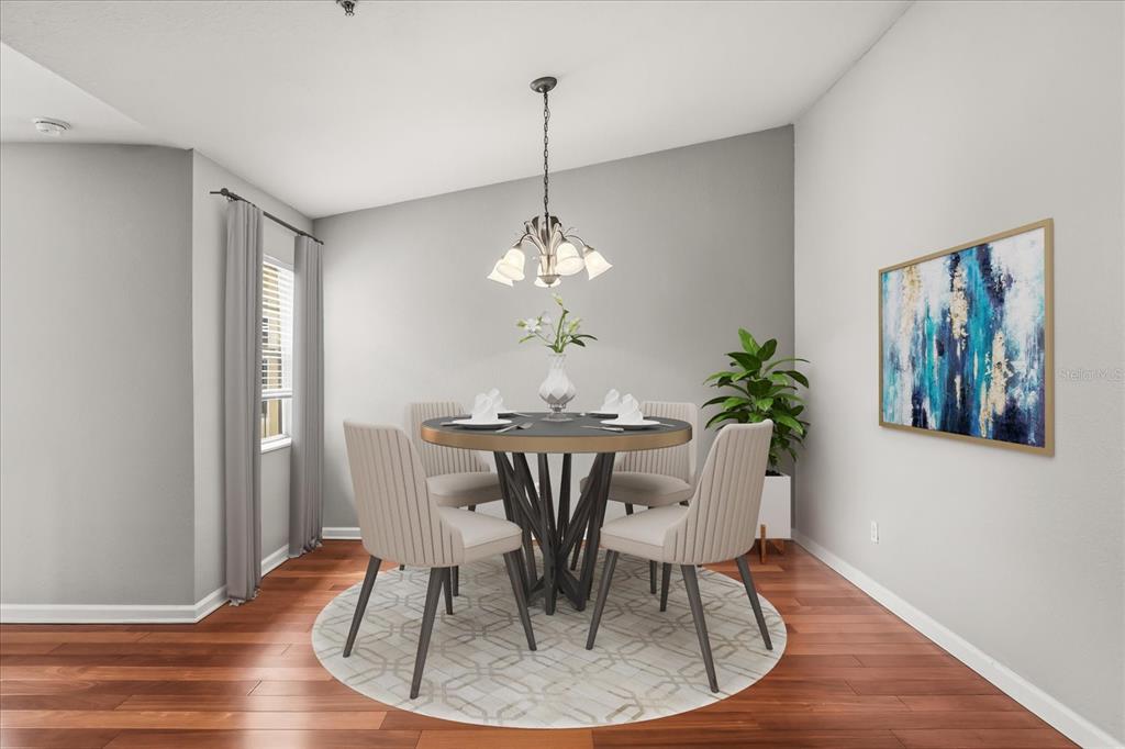 This is a digital rendering of a dining room featuring a round table and chairs — 6440 AXEITOS TERRACE UNIT 108, ORLANDO, FL