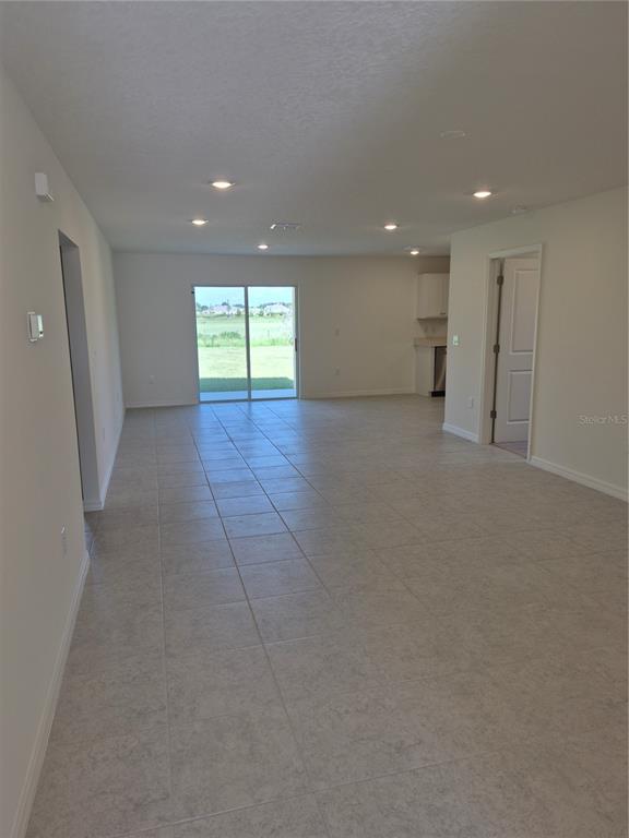 8805 PINE BARK WAY, WILDWOOD, FL — photo 4 of 5