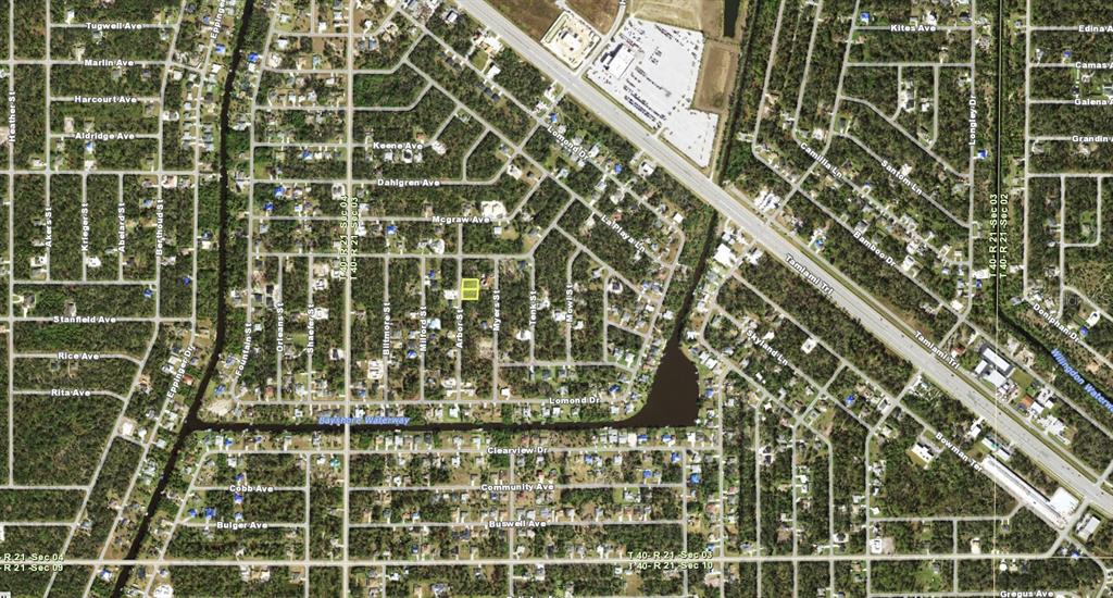 This is an aerial map showing a highlighted vacant lot in a residential neighborhood — 304 & 312 ARBOR STREET, PORT CHARLOTTE, FL