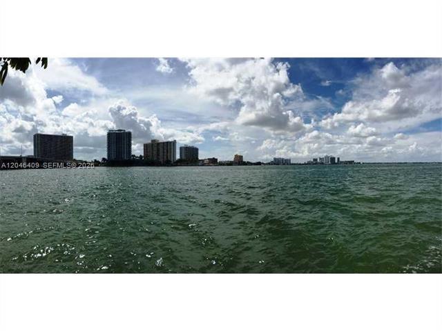 A wide-angle view of a body of water with a city skyline in the distance — 2130/2140 Bay Dr, Miami Beach FL 33141, MIAMI BEACH, FL