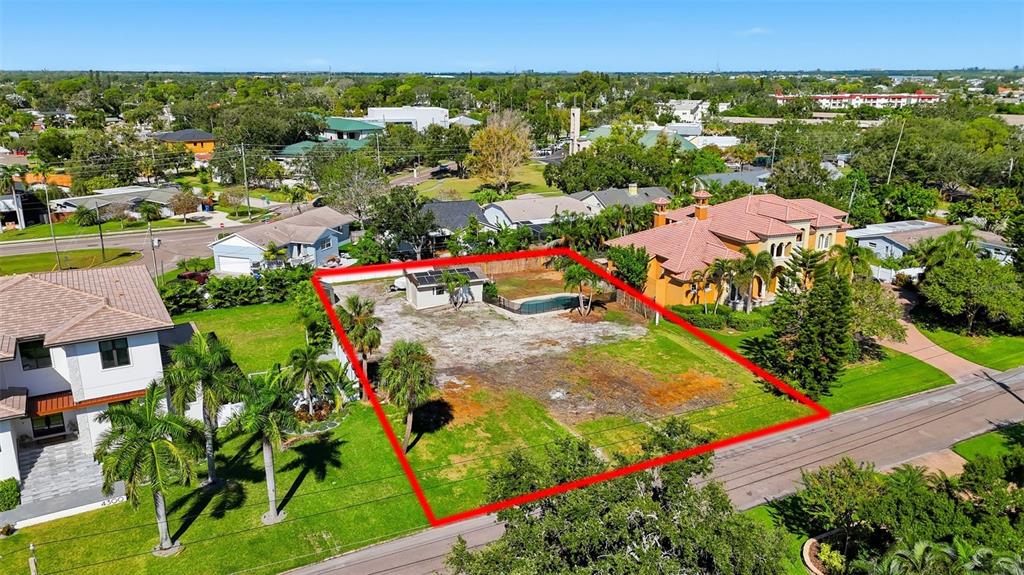 An aerial view shows a vacant residential lot outlined in red with a small shed — 4324 BAYSHORE BOULEVARD NE, ST PETERSBURG, FL