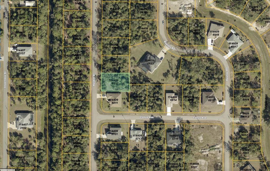 This is an aerial map showing residential property lots and street layouts — BASKET STREET, NORTH PORT, FL