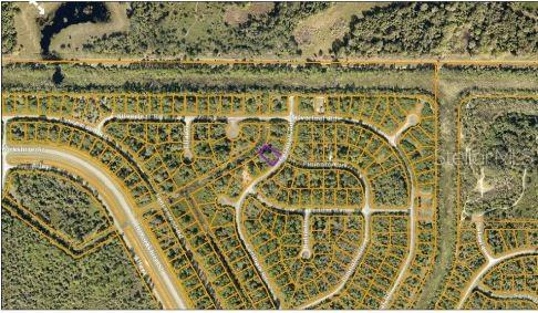 An aerial map view shows a highlighted vacant lot within a residential subdivision — CERIMAN ROAD, NORTH PORT, FL