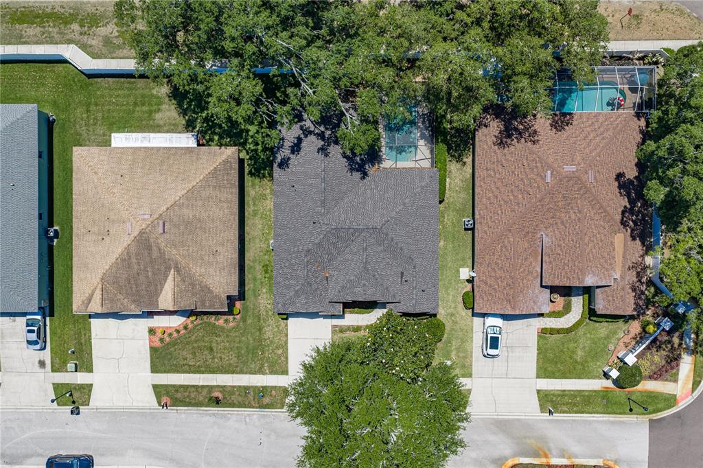 A single-story house with a gray exterior, a two-car garage, and a concrete driveway — 1603 GRAND HERITAGE BOULEVARD, VALRICO, FL