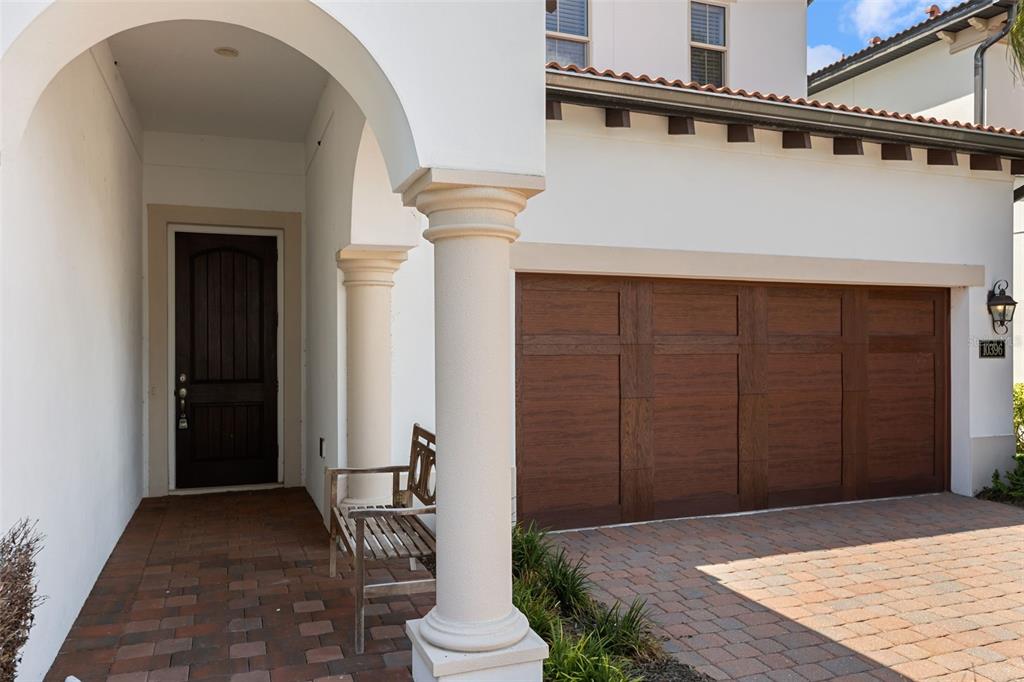 An aerial view shows a two-story house with a red tile roof and paved driveway — 10396 ROYAL CYPRESS WAY, ORLANDO, FL