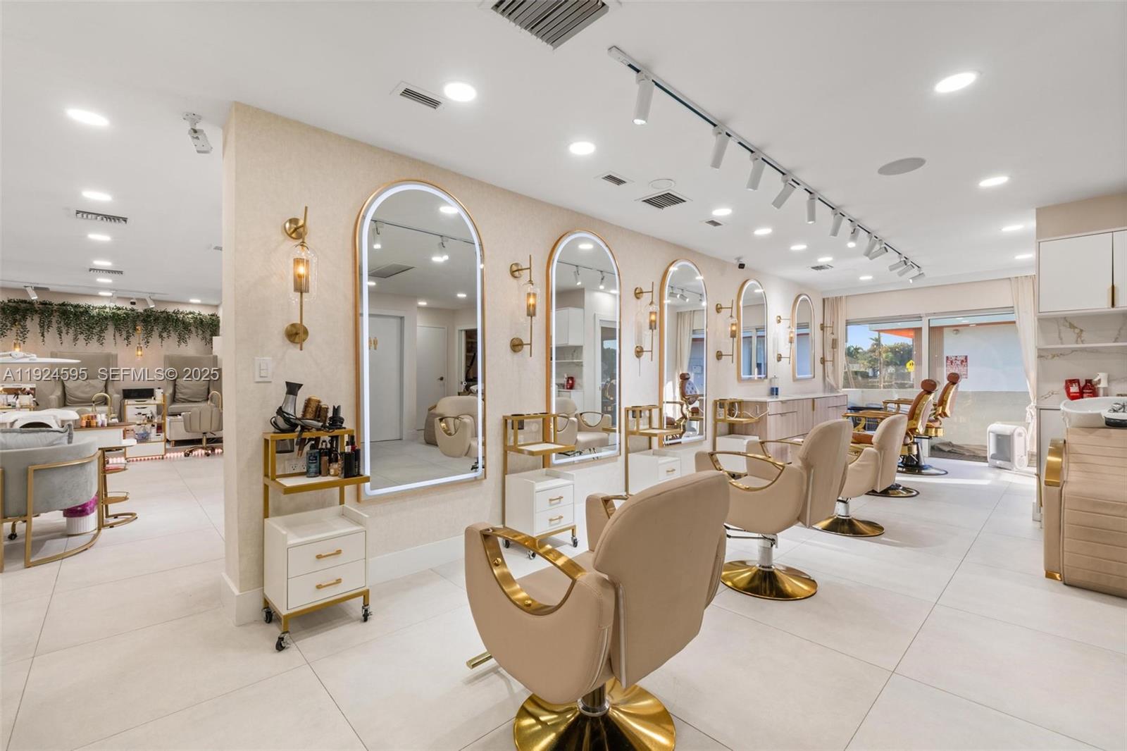A modern hair salon features multiple styling stations with arched mirrors and gold-accented chairs — 0000 SW 87th Ave, Miami FL 33165, MIAMI, FL
