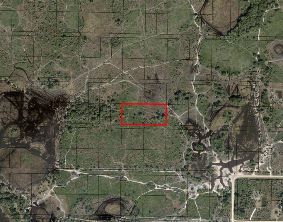 This is an aerial map view showing a rectangular plot of land outlined in red — 0 NW 306th Street, Okeechobee FL 34972, OKEECHOBEE, FL