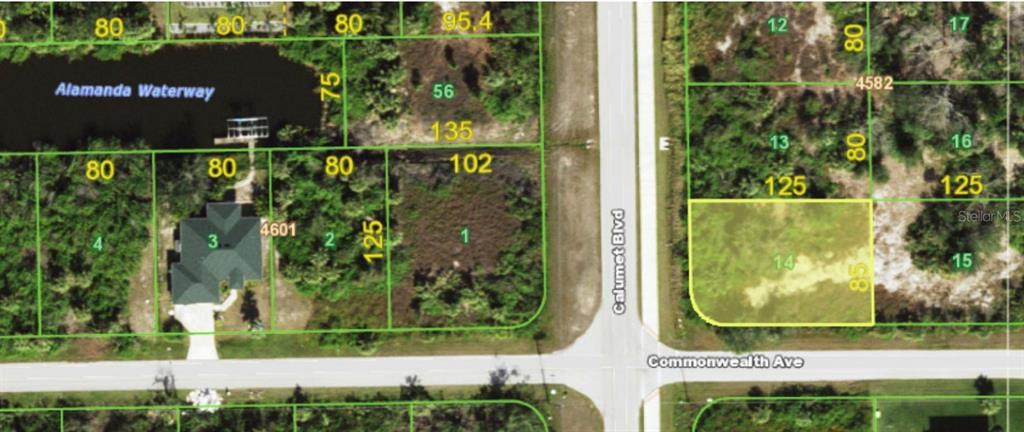 This is a map showing a vacant residential lot highlighted in yellow near a waterway — 13534 COMMONWEALTH AVE./10030 CALUMET BLVD., PORT CHARLOTTE, FL