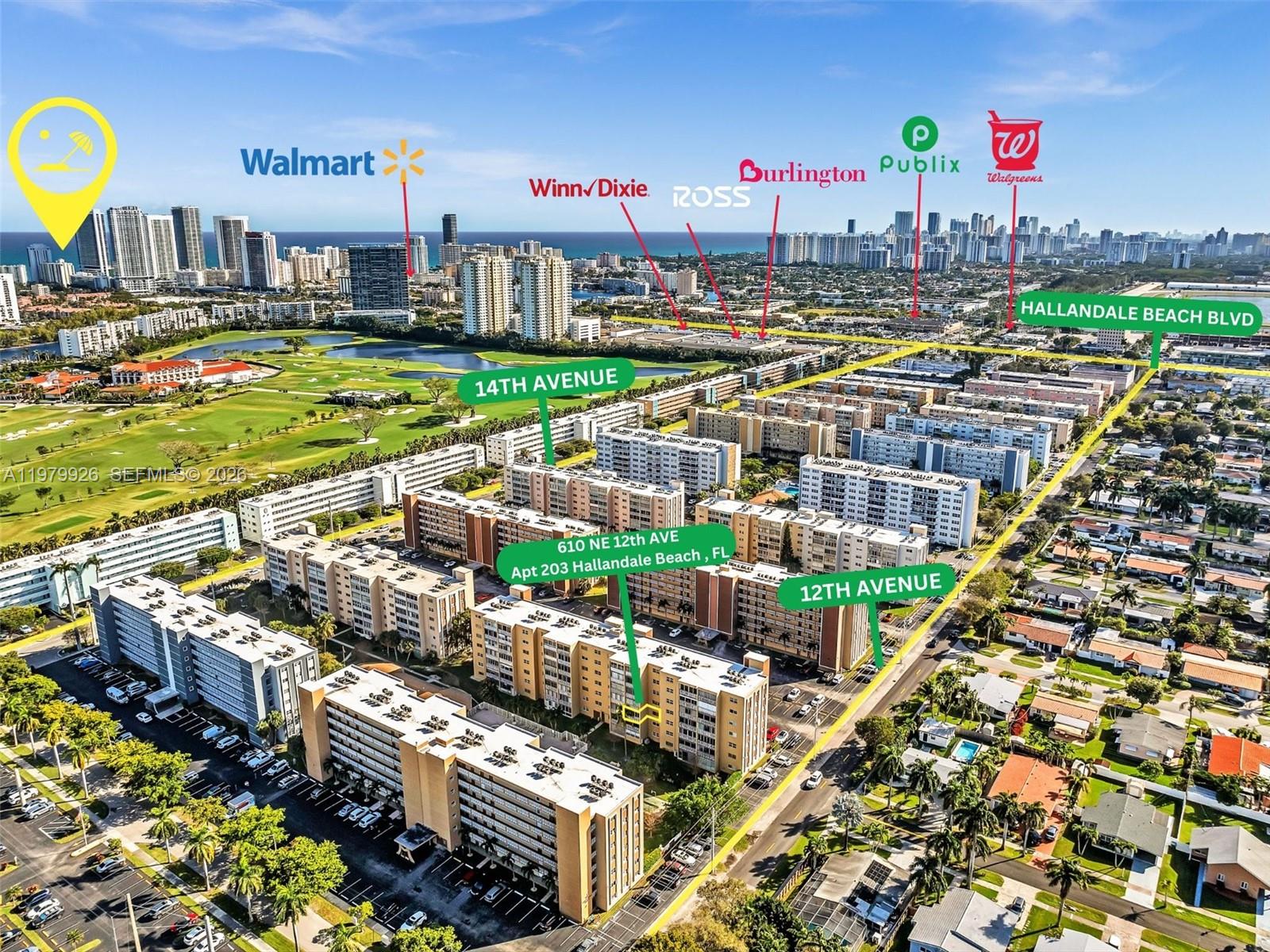 This aerial view shows a multi-story apartment complex surrounded by parking lots and a golf course — 610 NE 12th Ave # 203, Hallandale Beach FL 33009, HALLANDALE BEACH, FL