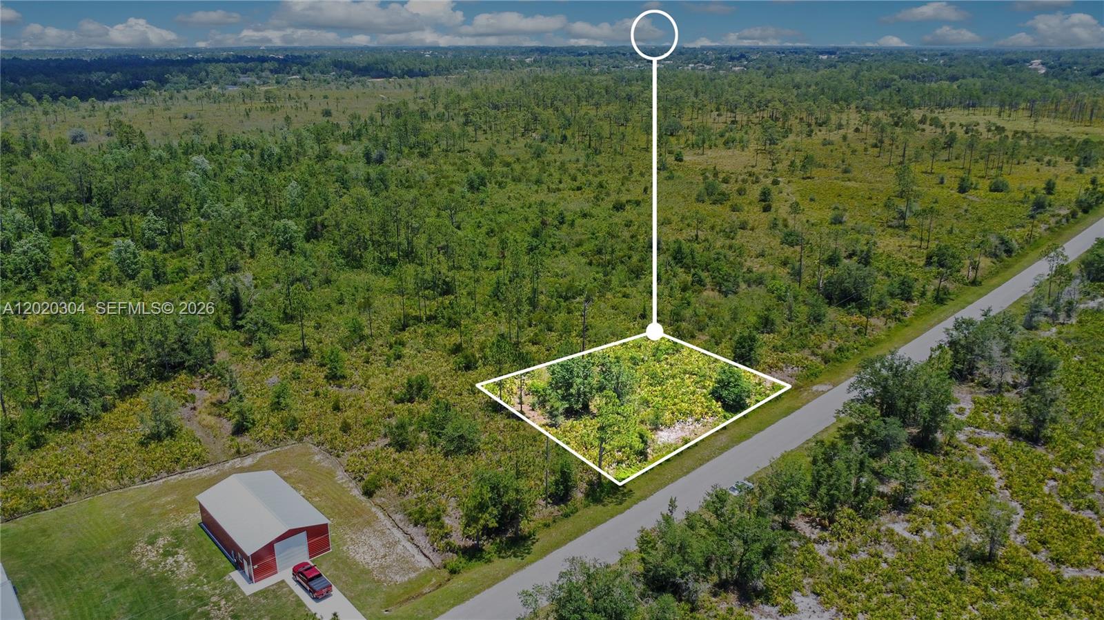 An aerial view shows a rectangular plot of land outlined in white beside a road — 4000 Gerona, Sebring FL 33872, SEBRING, FL
