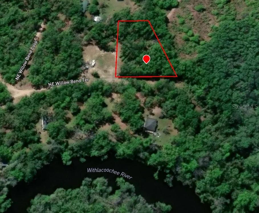 An aerial map view shows a wooded lot outlined in red near the Withlacoochee River — NE WILLOW BEND TERRACE, LEE, FL