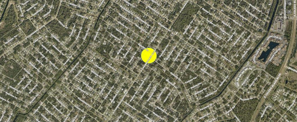 This is an aerial map view of a residential neighborhood with a yellow location marker — S CHAMBERLAIN BOULEVARD, NORTH PORT, FL