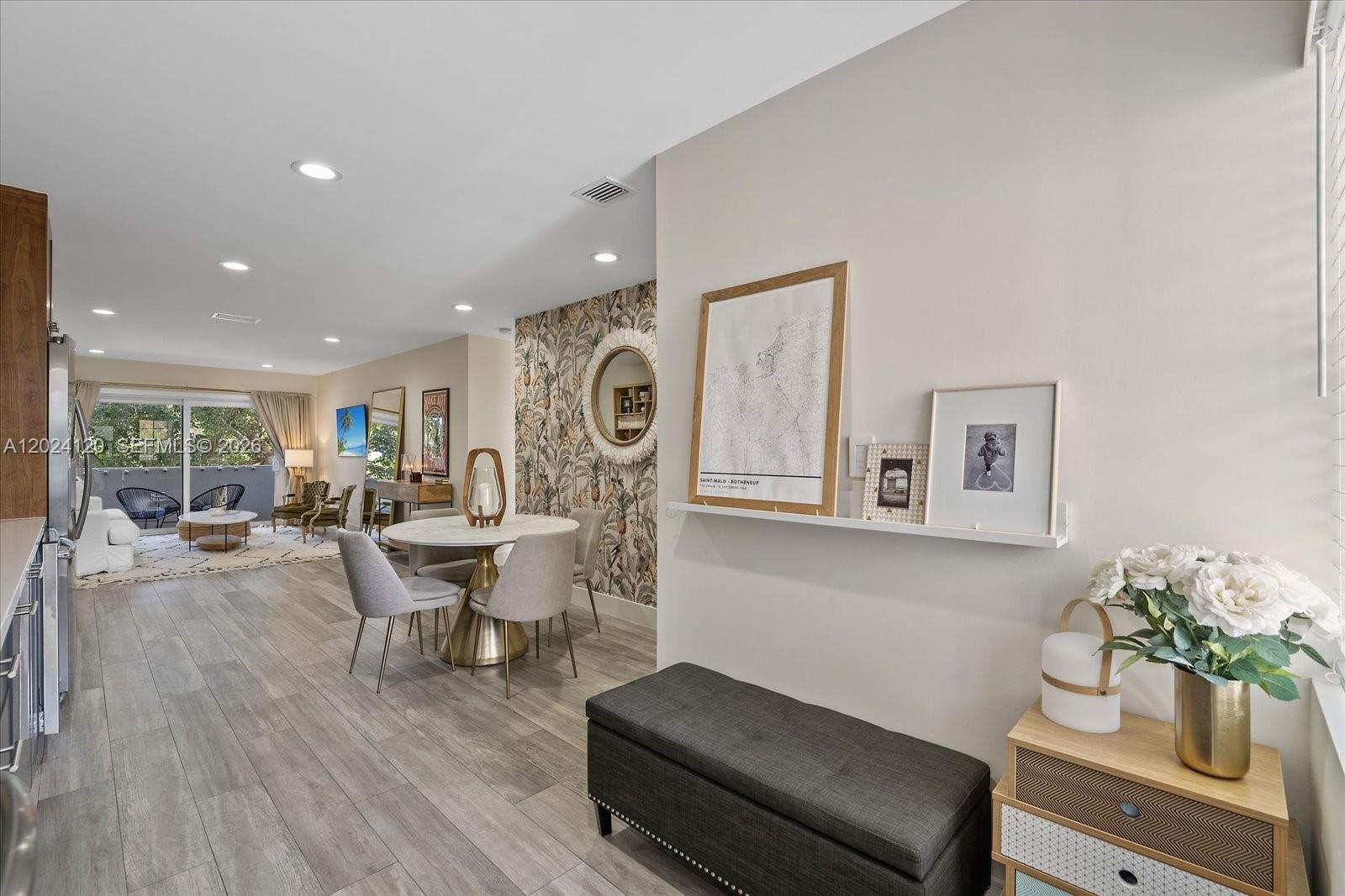 A dining area with patterned wallpaper and a living room with a balcony are visible — 300 Galen Dr # 306, Key Biscayne FL 33149, KEY BISCAYNE, FL