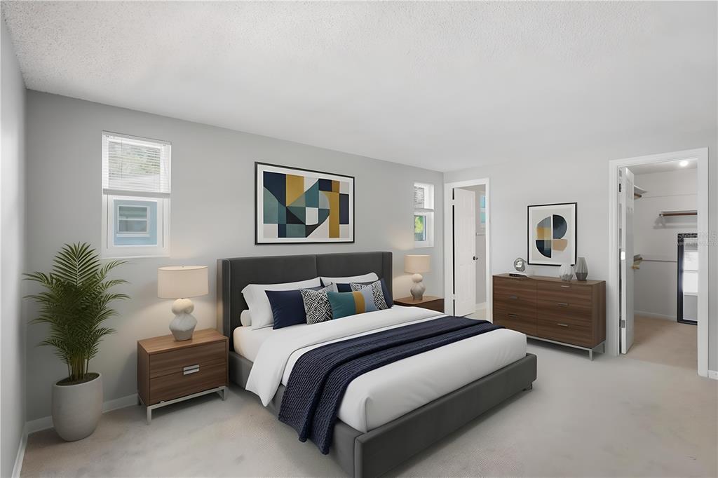 This is a digital rendering of a bedroom with a bed, dresser, and walk-in closet — 2281 CONWAY DRIVE, DELTONA, FL