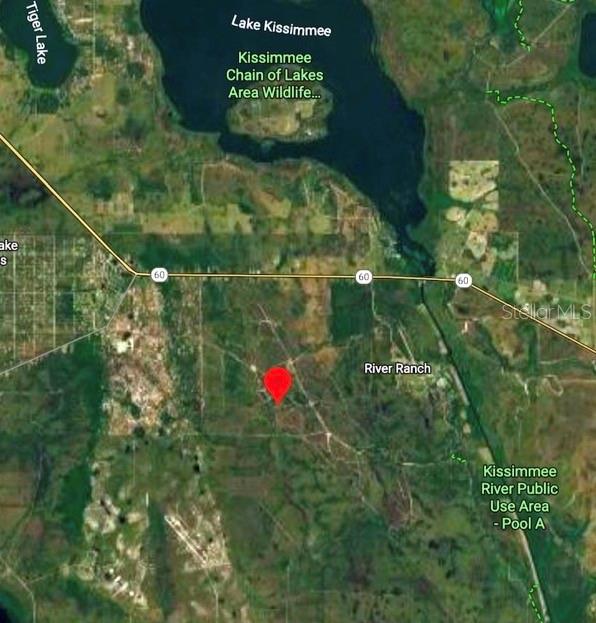 This is a satellite map showing a red location marker near River Ranch and Lake Kissimmee — RIVER RANCH BLVD, FROSTPROOF, FL