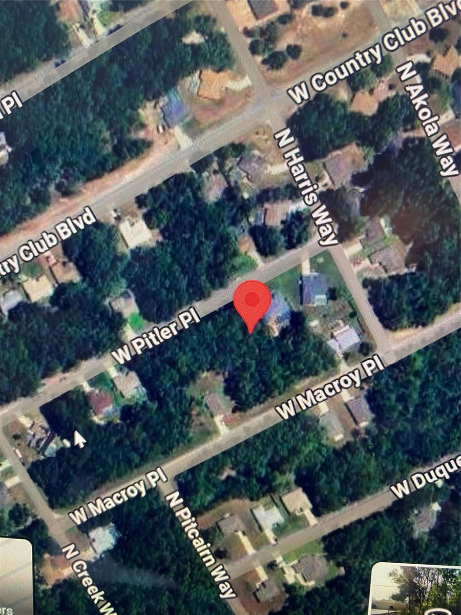 This is a satellite map view of a residential neighborhood with a red location pin — 684 W Pitler Place, FL 34434, FL