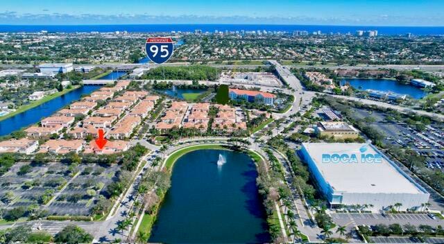 An aerial view shows a residential complex with a red arrow pointing to a unit — 8288 NW 9th Avenue, Boca Raton FL 33487, BOCA RATON, FL