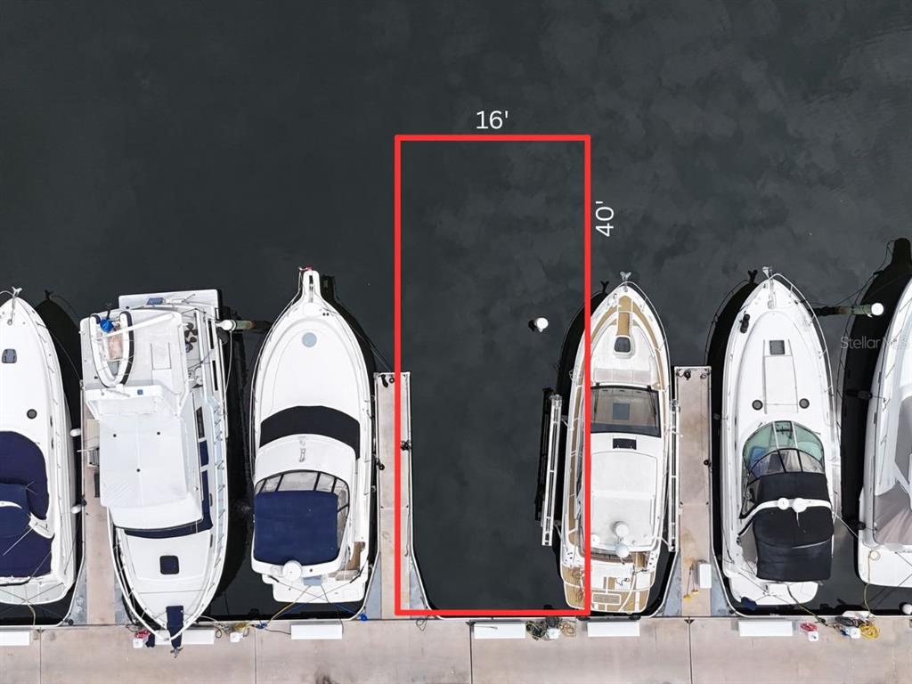 This is an aerial view of a vacant boat slip measuring 16 feet by 40 feet — 102 RIVIERA DUNES WAY UNIT N-14, PALMETTO, FL