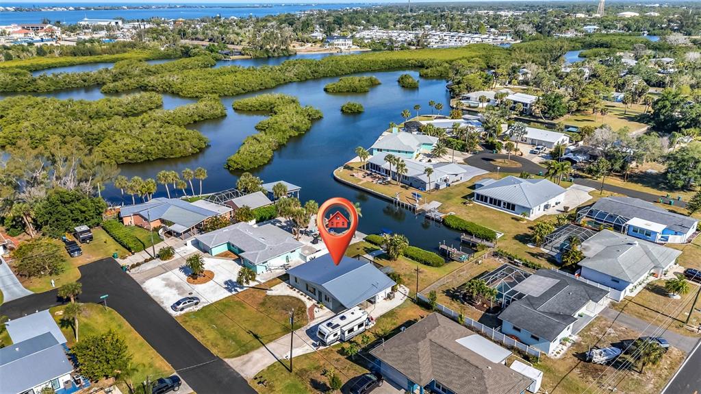 An aerial view shows a residential neighborhood with a house marked by a location pin — 1495 S MARYKNOLL ROAD, ENGLEWOOD, FL