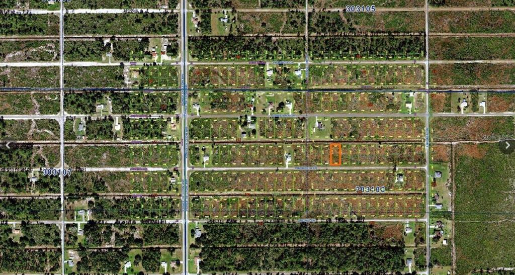 An aerial map view shows a rectangular lot highlighted in orange within a residential grid — 220 MAGNOLIA DRIVE, INDIAN LAKE ESTATES, FL