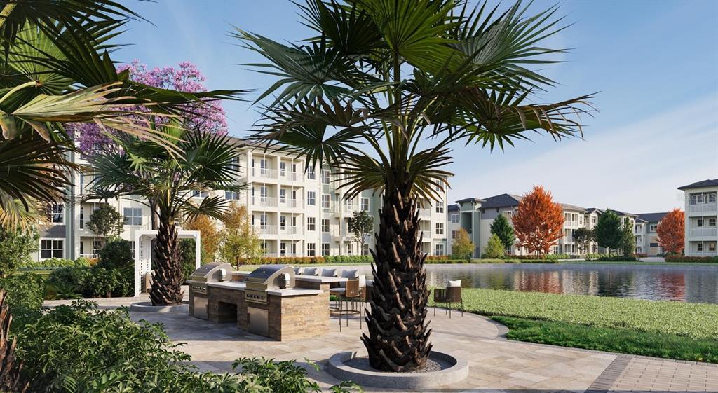This rendering shows an outdoor grilling area with palm trees overlooking a pond and apartments — 4005 BISMARK DRIVE UNIT A2L, KISSIMMEE, FL