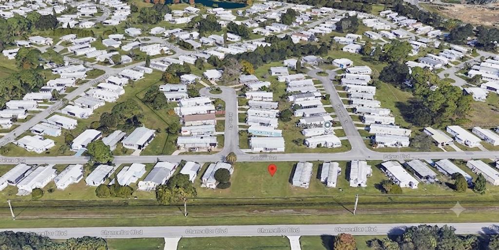 This aerial map view shows a vacant lot situated within a residential mobile home park — 5150 PALENA BOULEVARD UNIT 294, NORTH PORT, FL