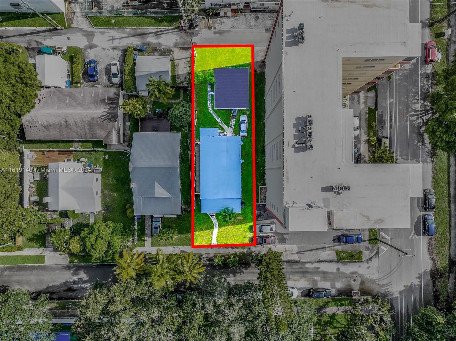 An aerial view shows a rectangular residential lot containing a house and a detached structure — 1711 Buchanan St, Hollywood FL 33020, HOLLYWOOD, FL