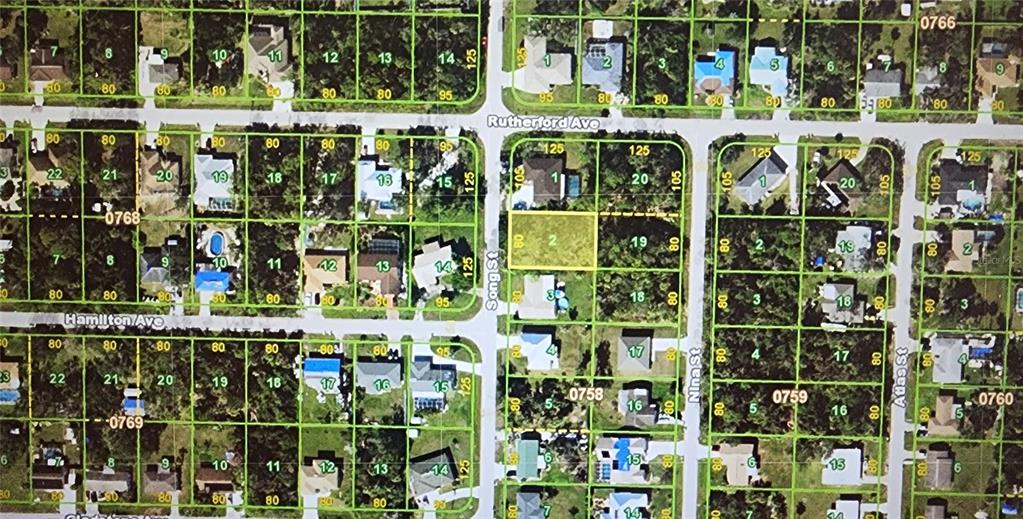 This is a satellite map showing residential property lots and street layouts — 1446 SONG STREET, PORT CHARLOTTE, FL