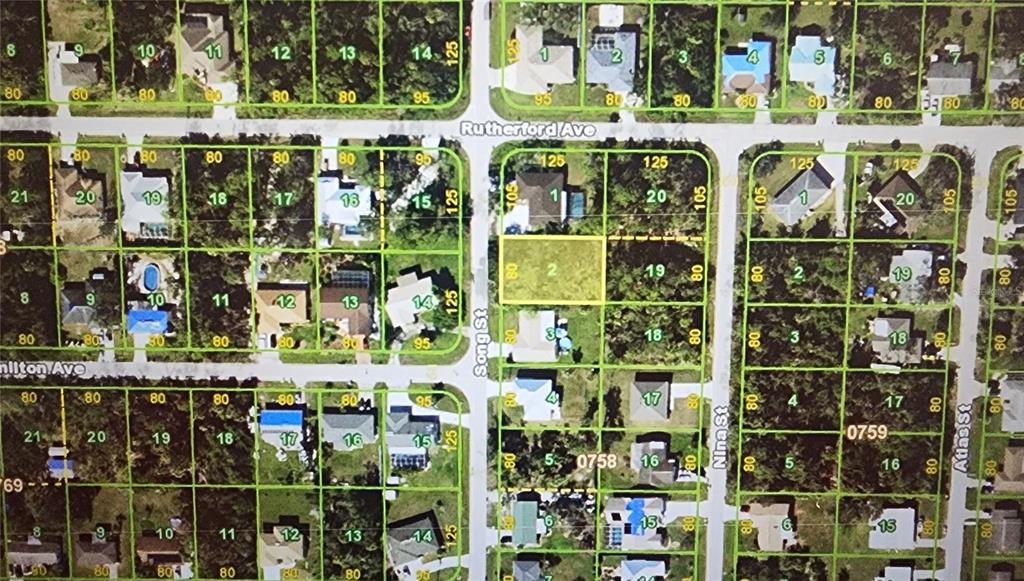 This is a satellite map showing residential lots and streets in a suburban neighborhood — 1446 SONG STREET, PORT CHARLOTTE, FL