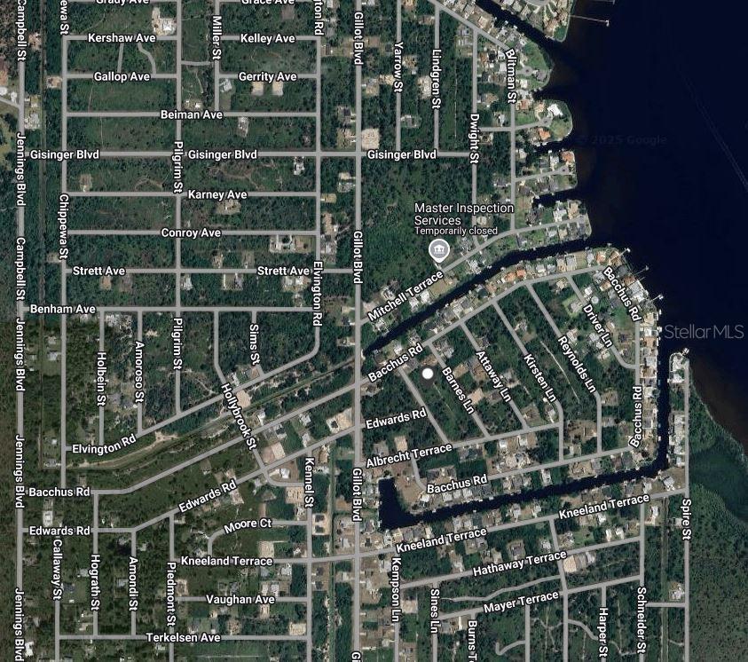 This is an aerial map view of a residential neighborhood with various streets and houses — 4190 AMIS LANE, PORT CHARLOTTE, FL