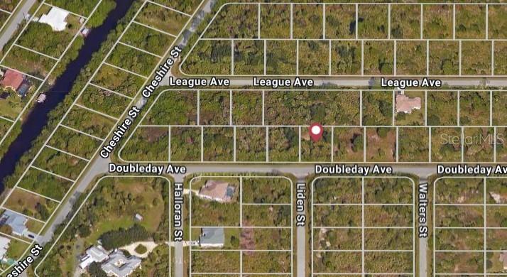 An aerial map view shows a vacant residential lot marked with a red pin — 13092 DOUBLEDAY AVENUE, PORT CHARLOTTE, FL
