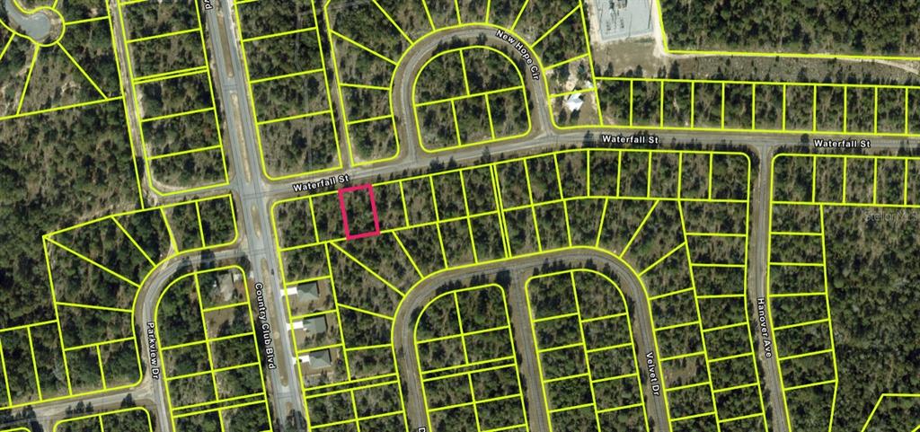 This is an aerial map showing a highlighted vacant residential lot located on a street corner — Lot 4, Unit 2, Blk 210 WATERFALL STREET, CHIPLEY, FL