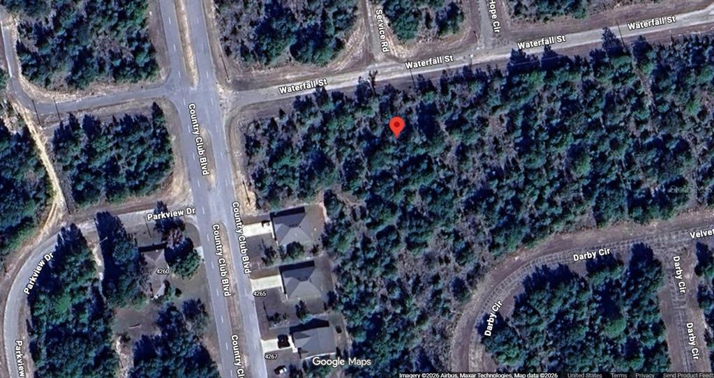 This is a satellite map view showing a wooded lot marked with a red pin — Lot 4, Unit 2, Blk 210 WATERFALL STREET, CHIPLEY, FL