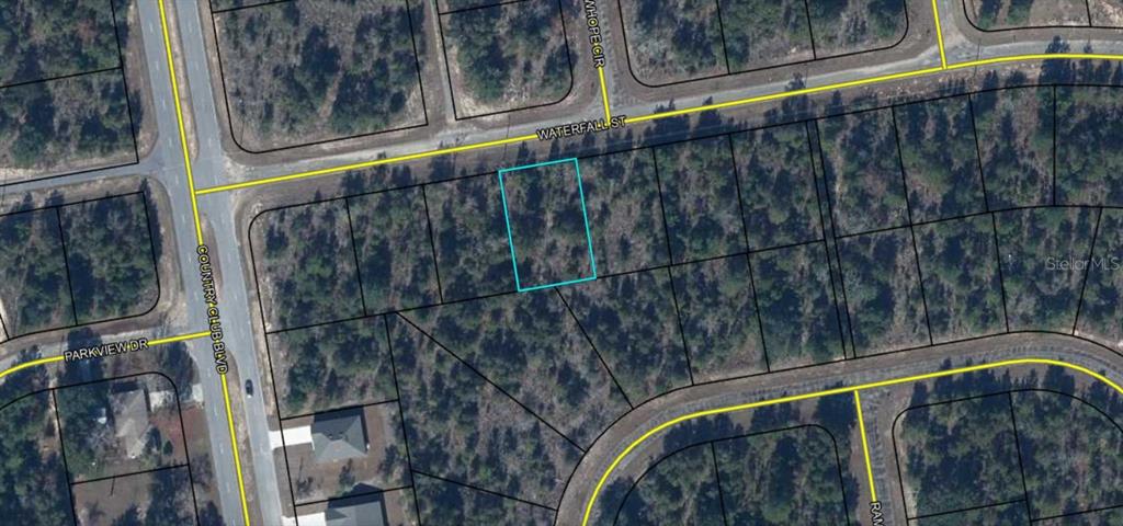 This is an aerial map showing a vacant residential lot outlined in blue on a street — Lot 4, Unit 2, Blk 210 WATERFALL STREET, CHIPLEY, FL