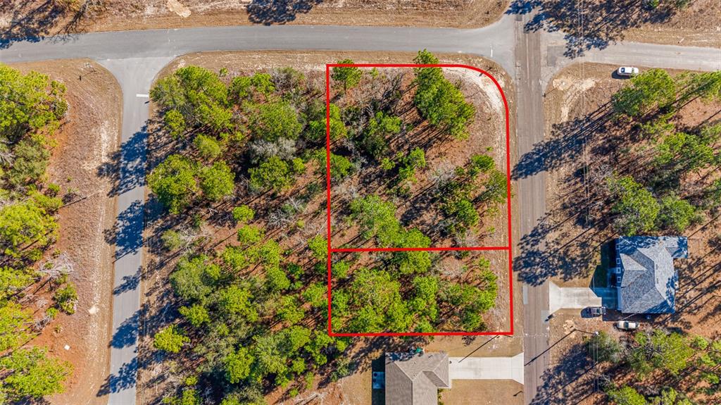 This aerial view shows two adjacent wooded residential lots outlined in red — 6932 N GLENRIDGE CIRCLE, CITRUS SPRINGS, FL