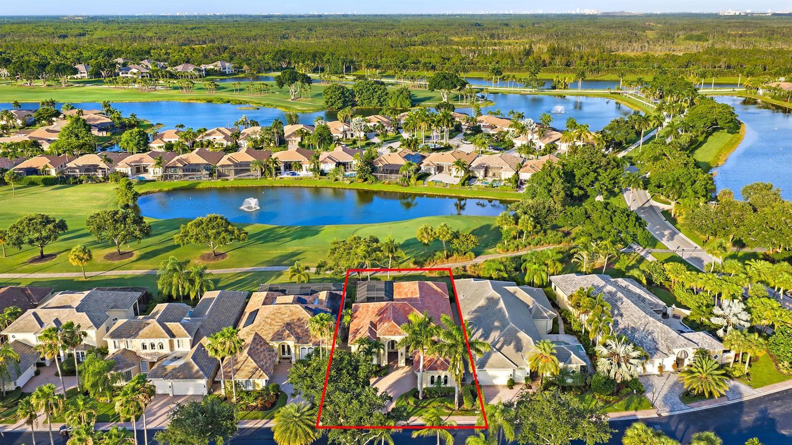 An aerial view shows a residential house with a red-tiled roof in a golf community — 7440 Monte Verde Lane, West Palm Beach FL 33412, WEST PALM BEACH, FL