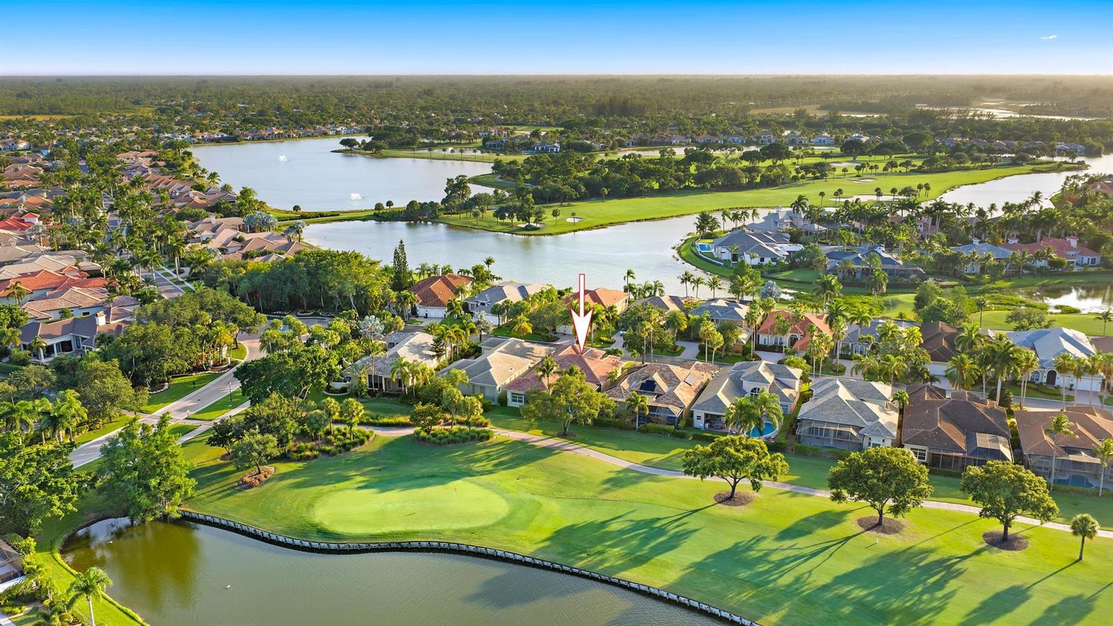 An aerial view of a residential neighborhood featuring houses situated along a golf course — 7440 Monte Verde Lane, West Palm Beach FL 33412, WEST PALM BEACH, FL
