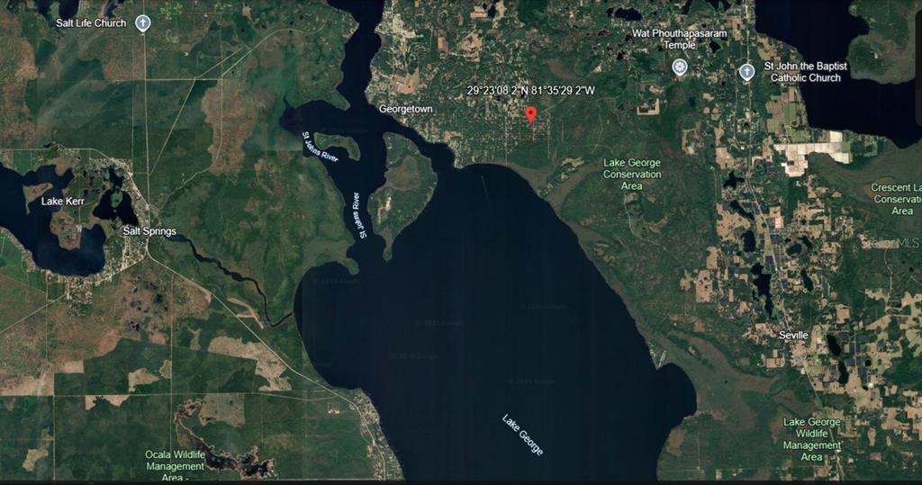 This is a satellite map view showing Lake George, the St. Johns River, and surrounding areas — 433 GARDENIA AVENUE, GEORGETOWN, FL