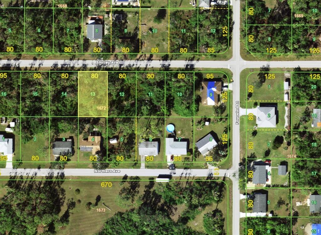 This is an aerial map showing residential lots and streets in a suburban neighborhood — 18095 SHIRLEY AVENUE, PORT CHARLOTTE, FL