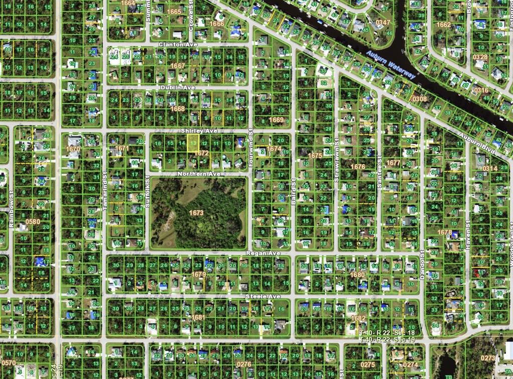 This is a map showing residential lots, street names, and block numbers in a suburban neighborhood — 18095 SHIRLEY AVENUE, PORT CHARLOTTE, FL