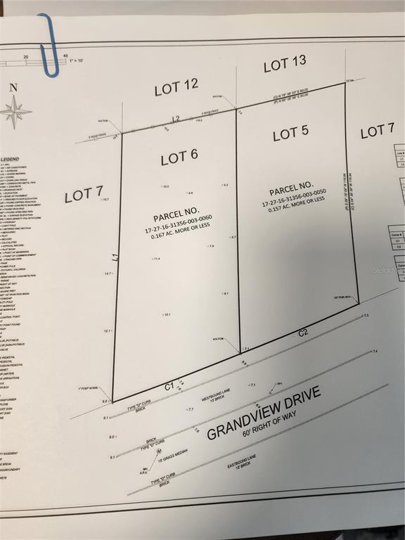 This is a survey map showing two adjacent land parcels along Grandview Drive — GRANDVIEW DRIVE, TARPON SPRINGS, FL