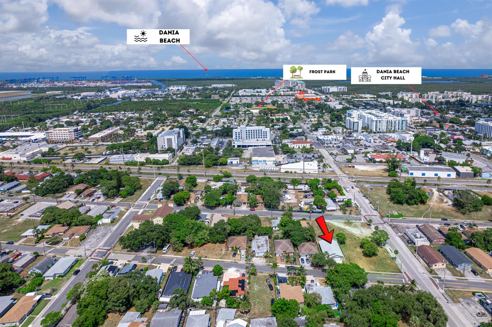 An aerial view shows a residential neighborhood with a red arrow pointing to a house — 110 NW 6th Avenue, Dania Beach FL 33004, DANIA BEACH, FL