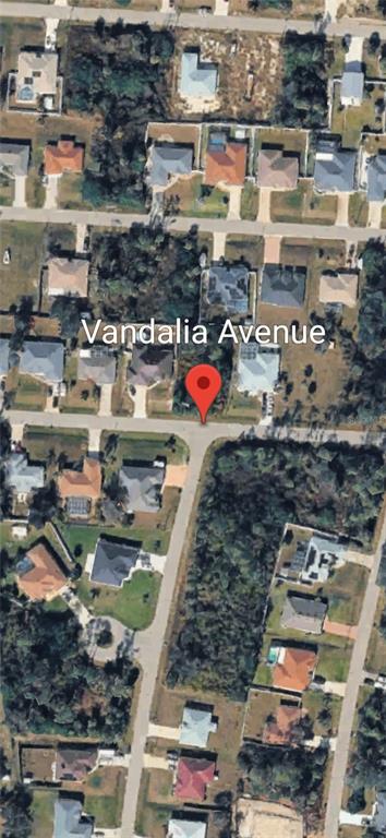 This is a satellite map view of a residential neighborhood with a red location pin — VANDALIA AVENUE, NORTH PORT, FL