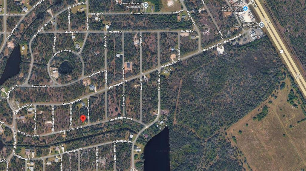 This is an aerial map view of a residential neighborhood with wooded lots and streets — 13283 PINE RUN TERRACE, PUNTA GORDA, FL